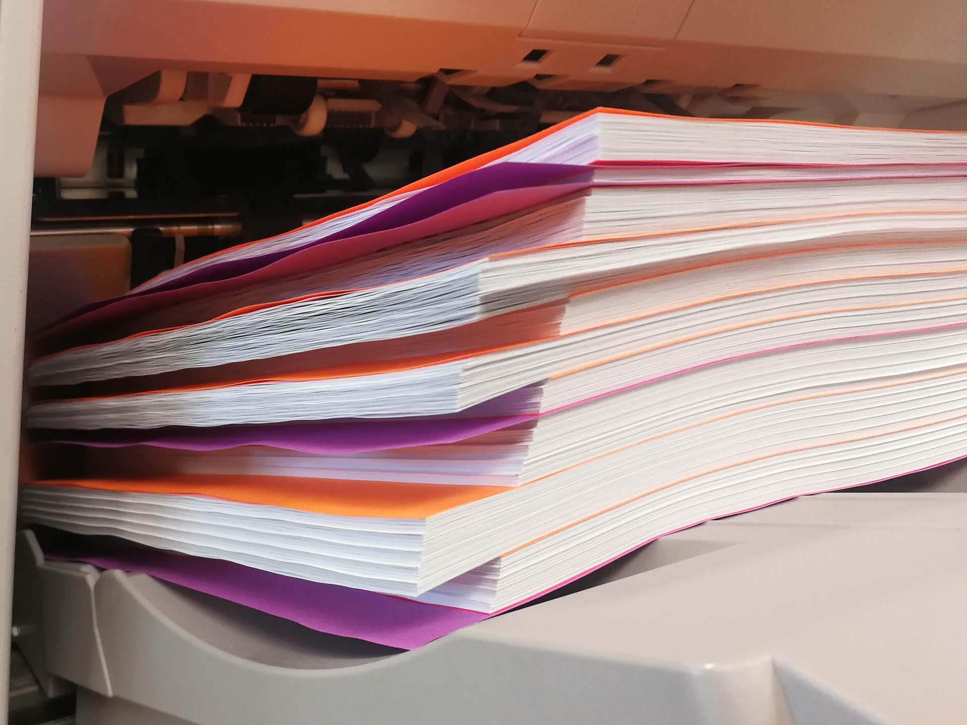 Shows a Job in Action, Purple Sheets are between Jobs, Red Sheets Between Sets, and Colored Paper between Pages